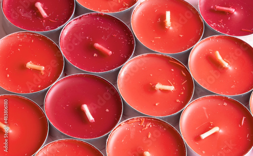 Red candles. Background of scented candles.