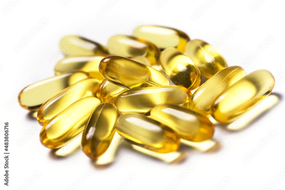 Closeup of capsules with a fish or krill oil Closeup of capsules with a fish or krill oil
