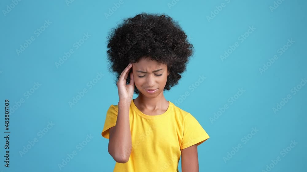 Kid girl high temperature migraine suffer isolated blue color background Kid girl high temperature migraine suffer isolated blue color background