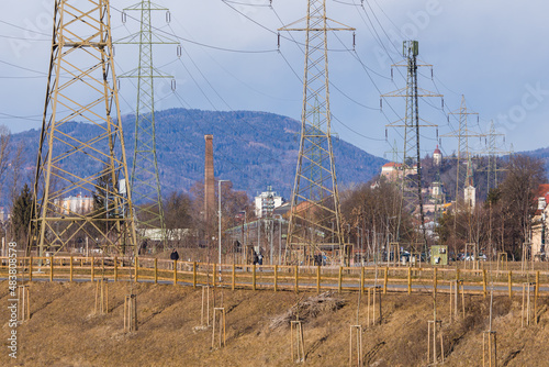 Massive power lines bringing electricity to the urban area of the city of Graz in Austria photo