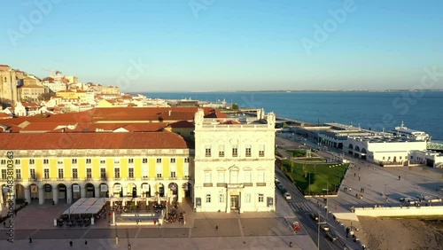 Aerial drone view of the Augusta Street Arch from Commerce Square in Lisbon, Portugal. Winter sunset. (ID: 483810363)