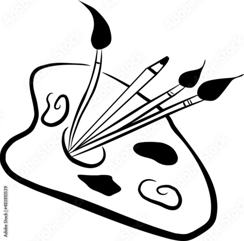 Paint brushes and pencil with paint palette ready to paint
