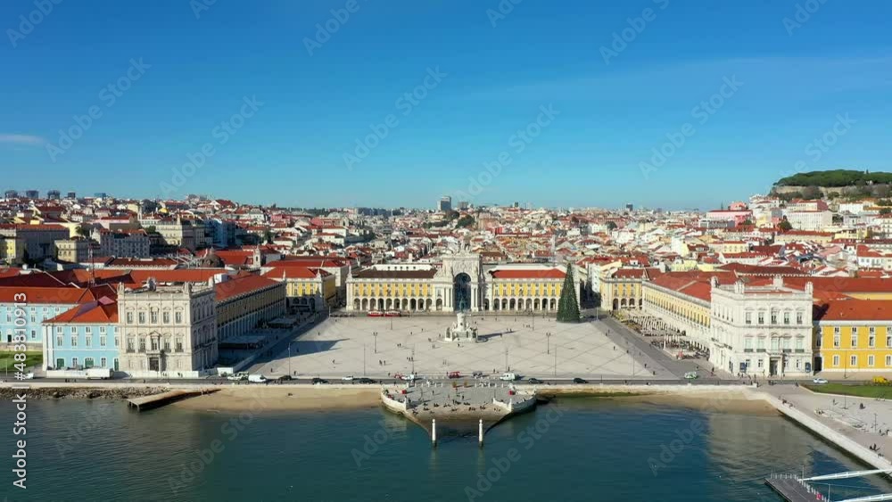 Aerial drone view of the Augusta Street Arch from Commerce Square in Lisbon, Portugal. Sunny day with blue sky. Aerial drone view of the Augusta Street Arch from Commerce Square in Lisbon, Portugal. Sunny day with blue sky.