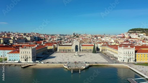 Aerial drone view of the Augusta Street Arch from Commerce Square in Lisbon, Portugal. Sunny day with blue sky. (ID: 483810913)