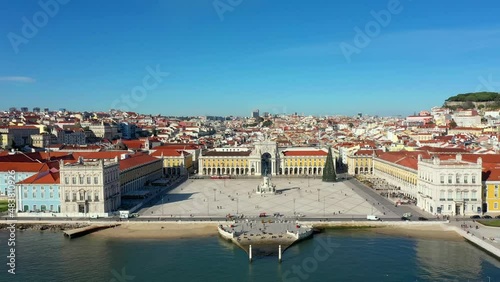 Aerial drone view of the Augusta Street Arch from Commerce Square in Lisbon, Portugal. Sunny day with blue sky. (ID: 483810926)