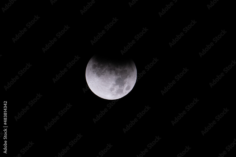 Full moon undergoing an eclipse as the earth shadow passes over our planets only natural satellite which also affects our tides Full moon undergoing an eclipse as the earth shadow passes over our planets only natural satellite which also affects our tides