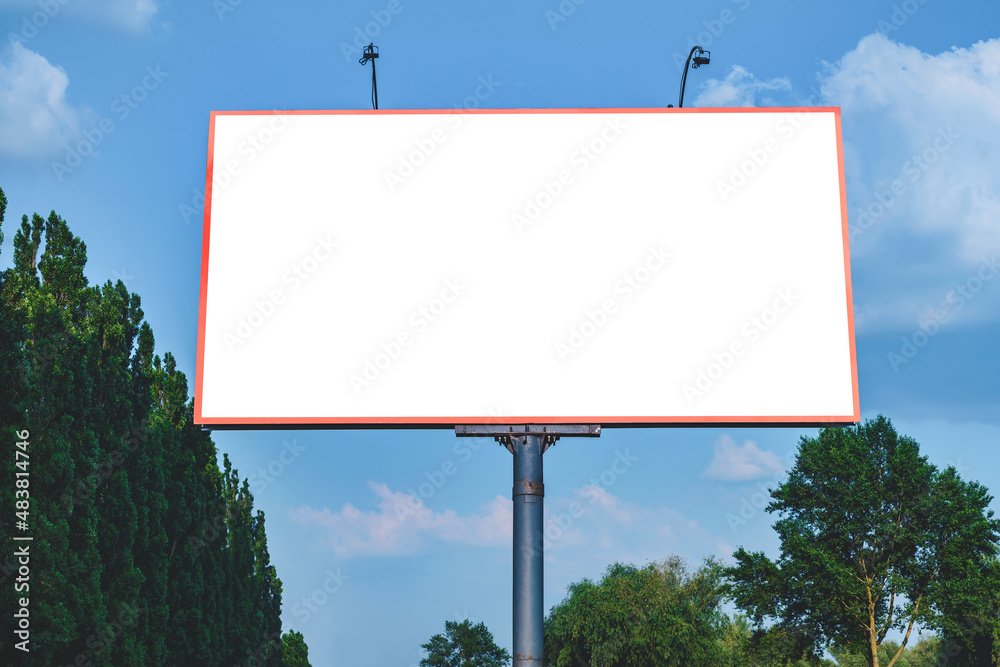 Blank billboard mockup with white screen. Against the backdrop of nature and blue sky. Business concept. Copy space banner for advertising. Blank billboard mockup with white screen. Against the backdrop of nature and blue sky. Business concept. Copy space banner for advertising.