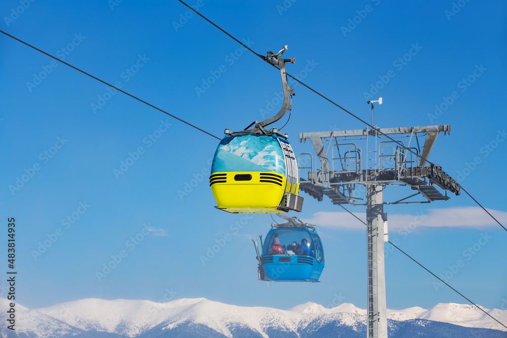 ski resort in Bulgaria, snow-covered track with lift, winter day