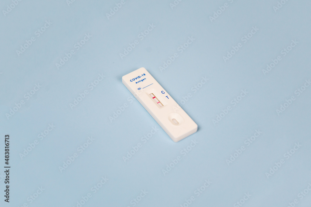 Covid-19 rapid antigen test kit. Positive test result using rapid testing device for COVID-19 virus Covid-19 rapid antigen test kit. Positive test result using rapid testing device for COVID-19 virus