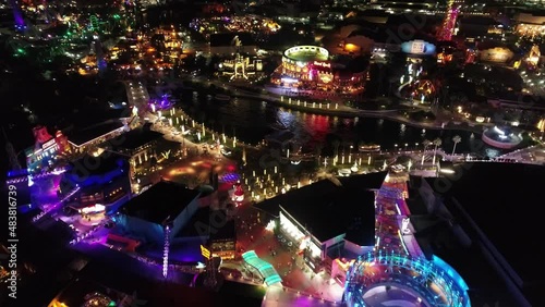 Night landscape of illumination attraction at amusement park at downtown Orlando United States. Night attraction at amusement park. Downtown Orlando Florida United States. photo