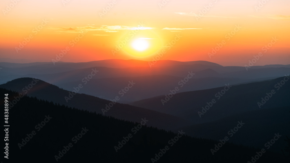 Majestic sunset captured on the top of Krkonose mountains, meadows, peace, sun, warm, good time. Dramatic sunset