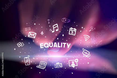 Finger touching tablet with social media icons concept