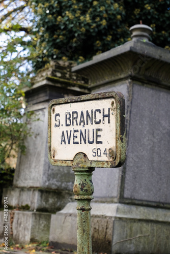 Closeup of an old metal sign in Kensal Green Cemetery, London, UK