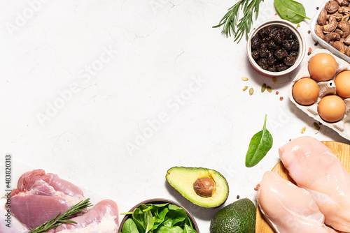 Vászonkép Fresh organic food for low carb keto diet on white marble background long banner format, copy space for your design