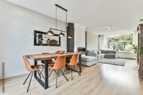 Dining room interior in modern urban appartment photo