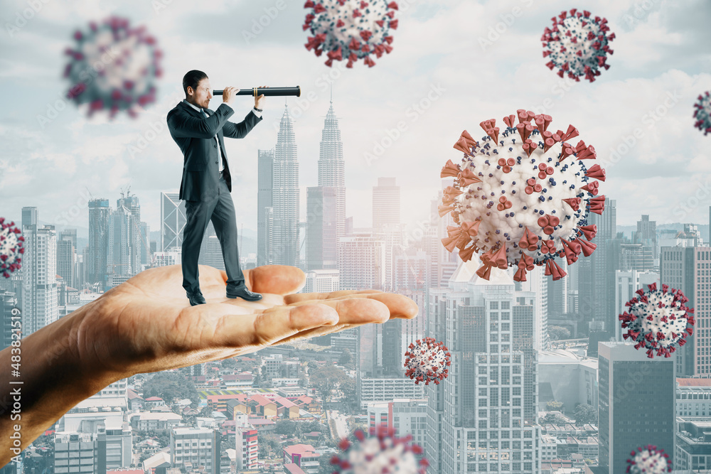 Obraz premium Abstract hand holding man with telescope looking into the distant future on daylight city background with virus. Pandemic, epidemic, coronavirus, health and medicine concept.