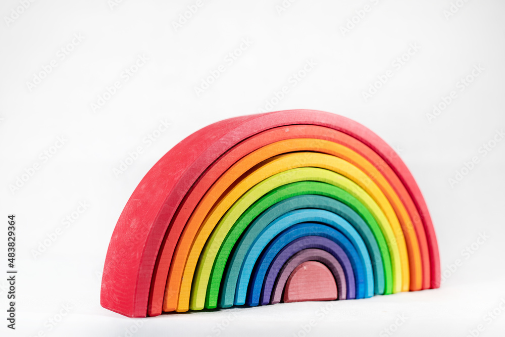 Obraz premium Wooden colorful kids toy rainbow in multiple colors 