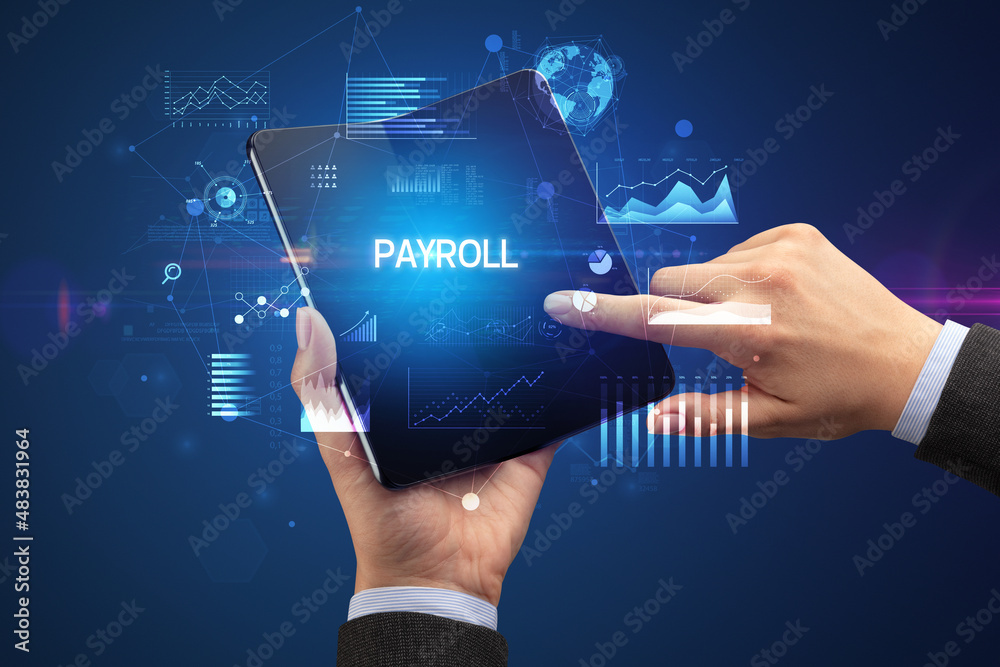 Businessman holding a foldable smartphone, business concept Businessman holding a foldable smartphone, business concept