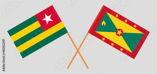 Crossed flags of Togo and Grenada. Official colors. Correct proportion