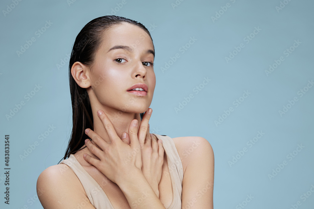 beautiful woman face cosmetics clean skin tenderness blue background beautiful woman face cosmetics clean skin tenderness blue background