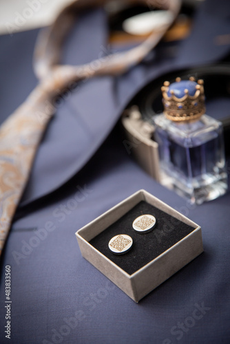 Groom wedding shirt, scuffling and perfume with tie background blur selective focus