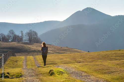 Woman walking through the bush in winter. Sorogain. Pilotasoro photo