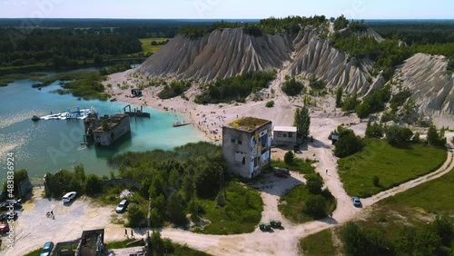 Sand dune formation. Flying over waterpark with abandoned underwater buildings. Summer scenery in estonia. 