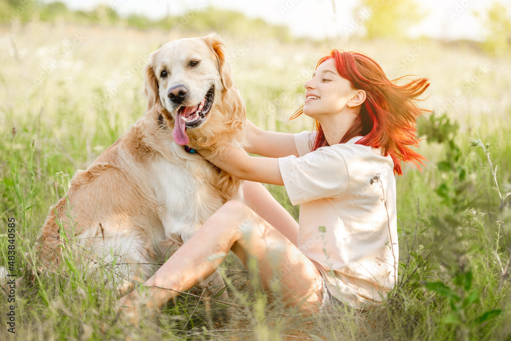 Teen girl with golden retriever dog Teen girl with golden retriever dog