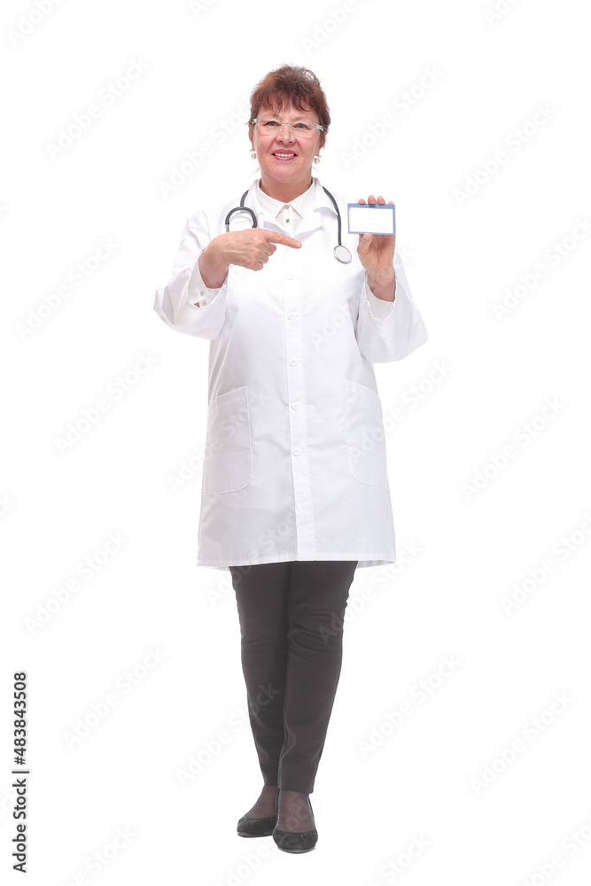 Senior woman doctor showing business card on a white background Senior woman doctor showing business card on a white background