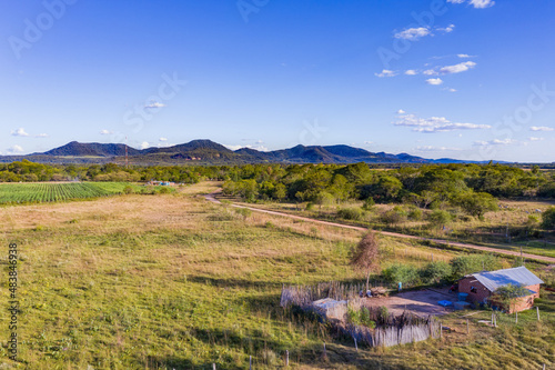 Poor rural area in Paraguay overlooking the Ybytyruzu Mountains photo