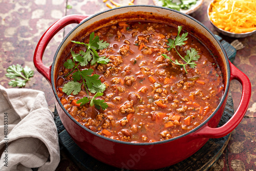 Photo Traditional chili soup with meat and red beans