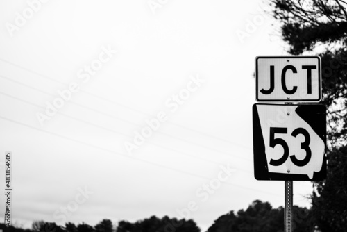 Black and white JCT 53 road sign 