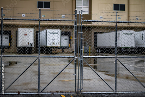 Sliver metal gate to industrial wear house 