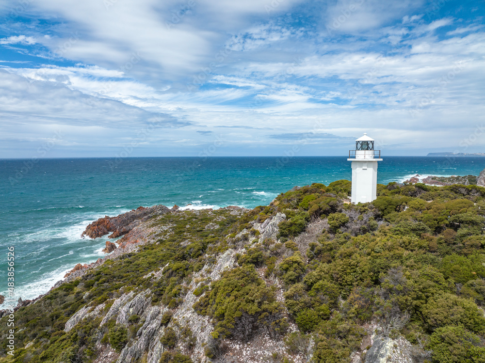 Beautiful high angle aerial drone view of Rocky Cape Lighthouse, part of Rocky Cape National Park, located on the North-West Coast of the island of Tasmania, Australia.	