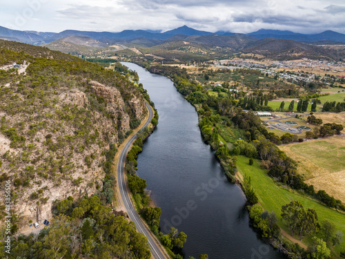 Leinwand Poster High angle aerial drone view of River Derwent, one of the major rivers on the island of Tasmania, Australia, near the town of New Norfolk, 30 kilometres from Tasmanias Capital City Hobart