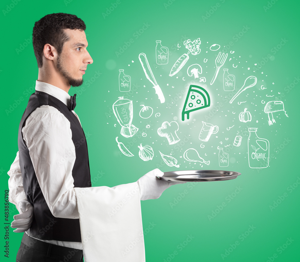 Waiter holding silver tray with food icons above Waiter holding silver tray with food icons above