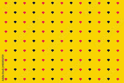 Colorful pattern of fresh pink and black mushrooms on yellow background. Champignon. Top view. Flat lay. Pop art design
