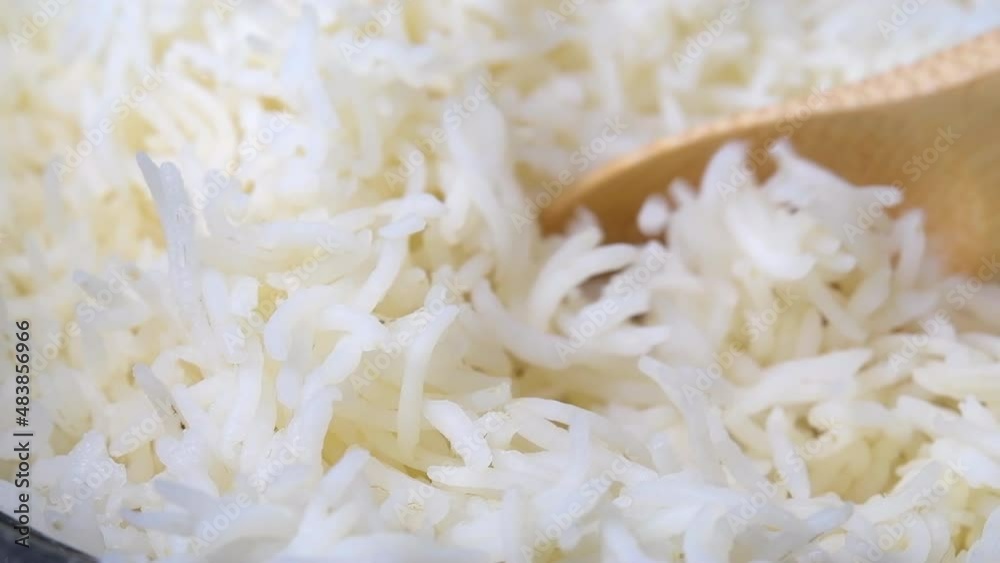 Slow-Motion Of Cooked White Rice Slow-Motion Of Cooked White Rice