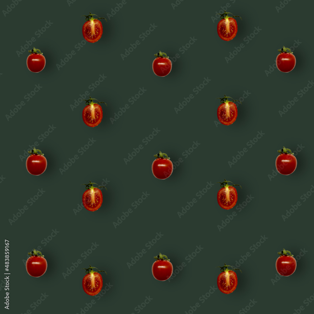 Colorful pattern of fresh red tomatoes on green background. Top view. Flat lay. Pop art design Colorful pattern of fresh red tomatoes on green background. Top view. Flat lay. Pop art design