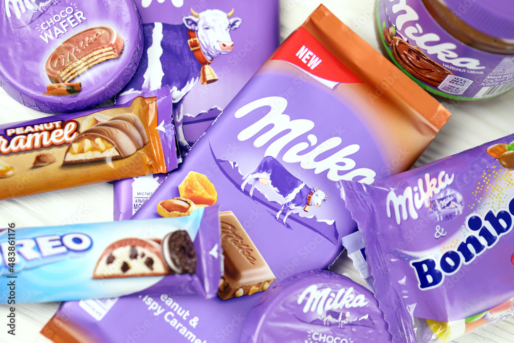 KHARKOV, UKRAINE - JULY 2, 2021: Milka chocolate products with classical  lilac color wrapping design on white table Photos | Adobe Stock