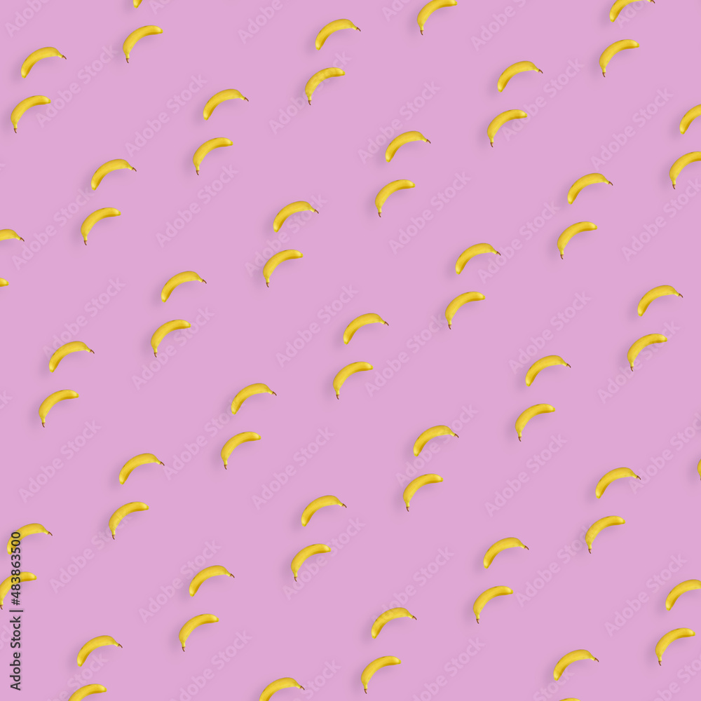 Colorful fruit pattern of yellow bananas on pink background. Top view. Flat lay. Pop art design