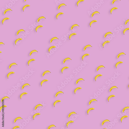 Colorful fruit pattern of yellow bananas on pink background. Top view. Flat lay. Pop art design © cac_tus