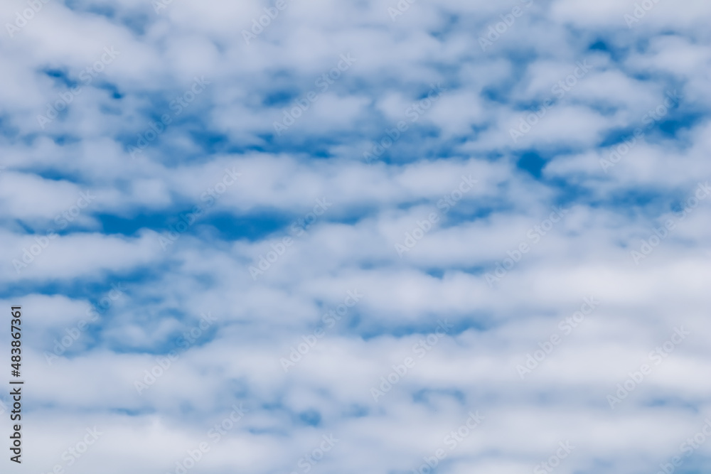 Obraz premium Background of blue sky with white clouds