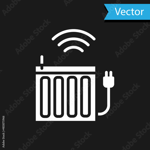 White Smart heating radiator system icon isolated on black background. Internet of things concept with wireless connection. Vector