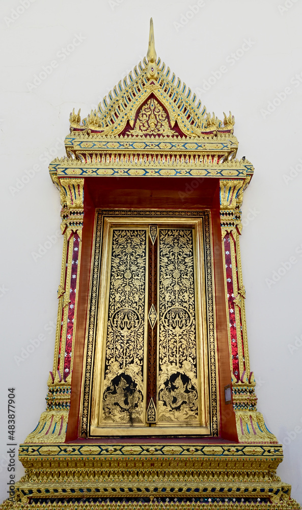 Golden Wood craft Thai classic pattern in thai temple at Bangkok, Thailand for design and decoration.
