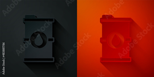 Paper cut Bio fuel barrel icon isolated on black and red background. Eco bio and canister. Green environment and recycle. Paper art style. Vector