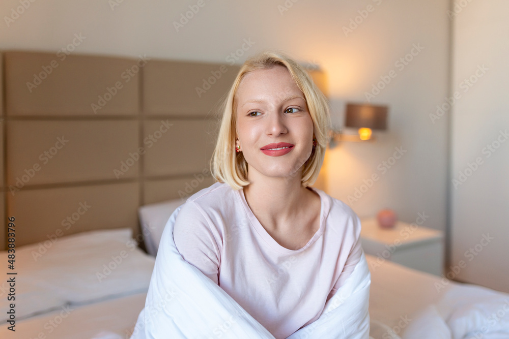 Woman wrapped in a blanket after wake up, entering a day happy and relaxed after good night sleep. Sweet dreams, good morning, new day, weekend, holidays concept Woman wrapped in a blanket after wake up, entering a day happy and relaxed after good night sleep. Sweet dreams, good morning, new day, weekend, holidays concept