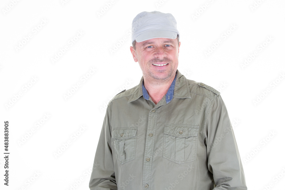 Happy man wearing a beige white cap in white background Happy man wearing a beige white cap in white background