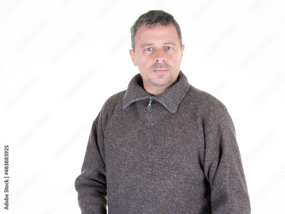Portrait attractive cheerful mature middle age man in sweat shirt over white background Portrait attractive cheerful mature middle age man in sweat shirt over white background