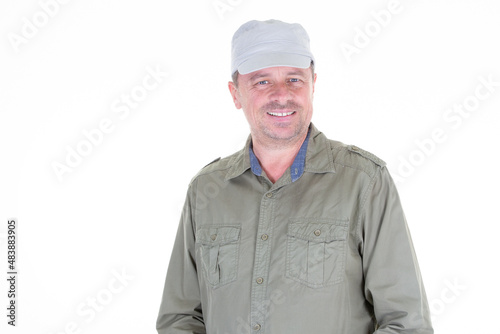 Happy man wearing a beige white cap in white background
